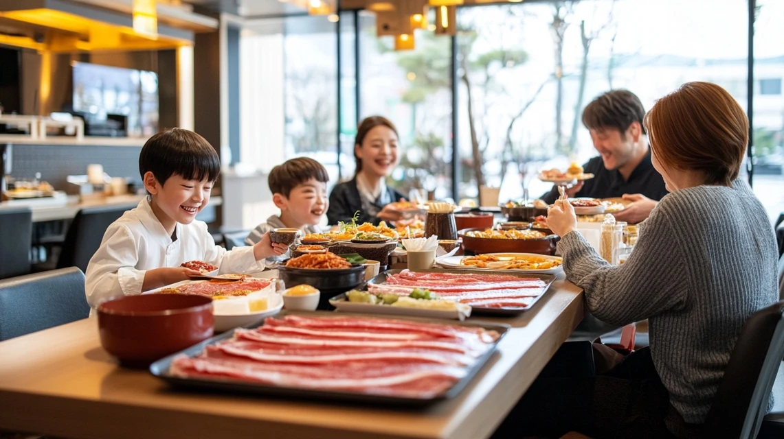 家族でプレミアムカルビ食べ放題を楽しむ日本人のイメージ